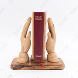 Praying Hands with The Holy Bible , Christian Sculpture .